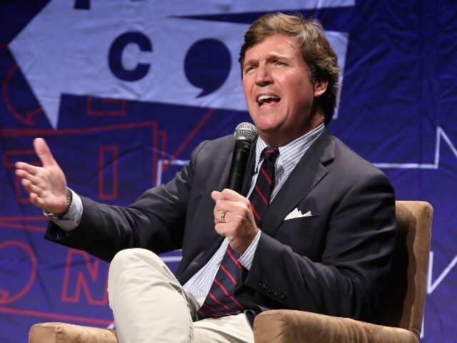 Tucker Carlson on stage