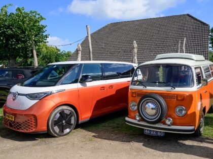 VW's electric ID Buzz bus next to a classic bus