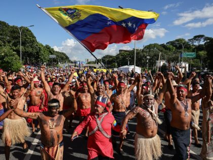 CARACAS, VENEZUELA - OCTOBER 12: People from diverse ethnic backgrounds participate in a r