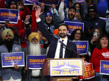 New York City mayoral candidate Zohran Mamdani waves to the crowd during a rally, Sunday,