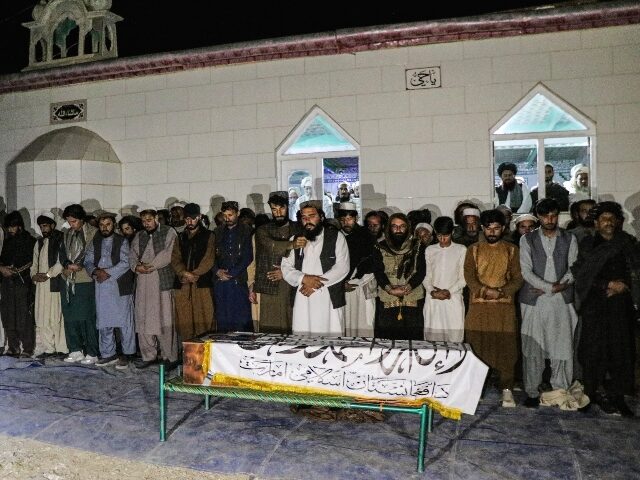 afghanistan-funeral-pakistan-clash-getty Afghan mourners and relatives gather around the Taliban flag-shrouded coffin of late Abdul