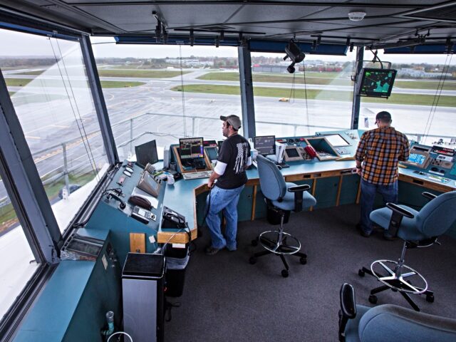 PORTLAND, ME - OCTOBER 26: Air traffic controllers Steven Schefcik, left, and Nicholas Doy