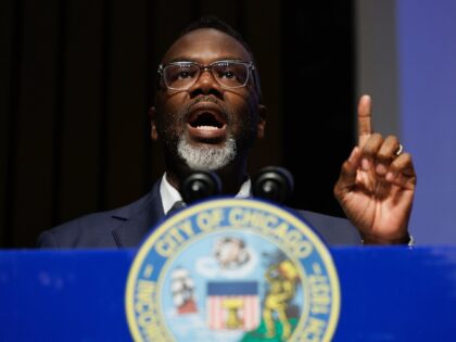 Chicago Mayor Brandon Johnson speaks with attendees during a budget roundtable discussion