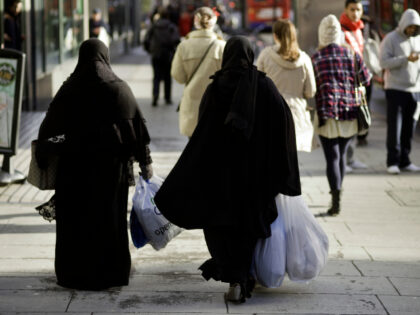 Europe, UK, England, London, View Of Two Muslim Women Wearing Burka's Cruising Edgwar