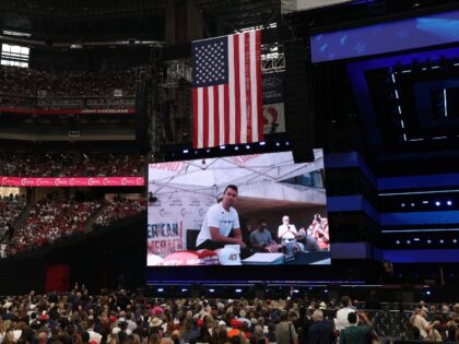 A video clip shows right-wing activist Charlie Kirk at a speaking event in Utah the day he