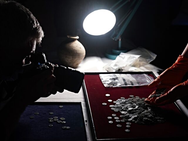 coins discovered A Roman coin hoard of over 6.500 copper-alloy nummi (coins), originally contained in three