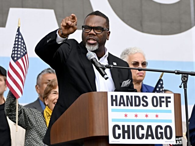 crime in chicago CHICAGO, ILLINOIS - OCTOBER 18: Brandon Johnson, Mayor of Chicago, speaks onstage as peopl
