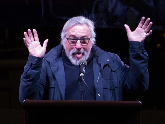 Robert De Niro speaks at the "We Stand United" rally on the eve of U.S. President-elect Do