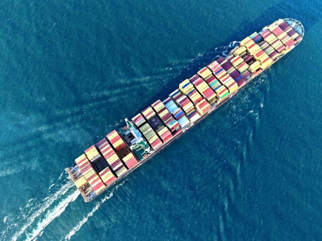 global tax A cargo ship carrying foreign trade containers set sail from the port of Qingdao in Qingda