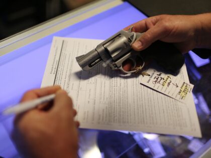 DELRAY BEACH, FL - JANUARY 05: Mark O'Connor fills out his Federal background check paperw