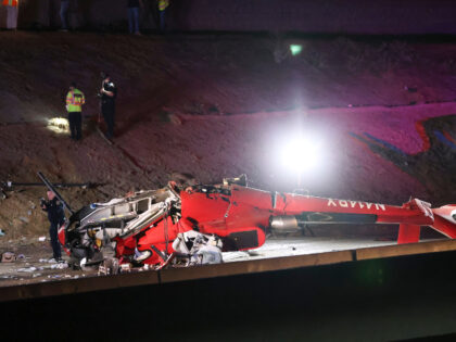 A medical helicopter is shown after it crashed on Highway 50 Monday, Oct. 6, 2025, in Sacr