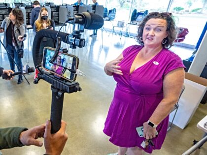 Irvine, CA - March 02: Congresswoman and U.S. Senate candidate Katie Porter, right, speaks