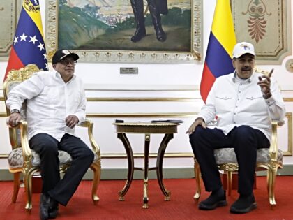 CARACAS, VENEZUELA - APRIL 09: Venezuelan President Nicolas Maduro (R) meets Colombian Pre