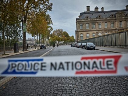 PARIS, FRANCE - OCTOBER 19: French Police officers seal off the area of a at The Louvre Mu
