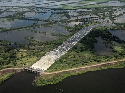 This aerial view taken during a Mexican Navy flyover shows the Cazones River overflowed af