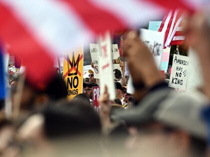 People take part in a "No Kings" protest in Washington, D.C., the United States, on Oct. 1