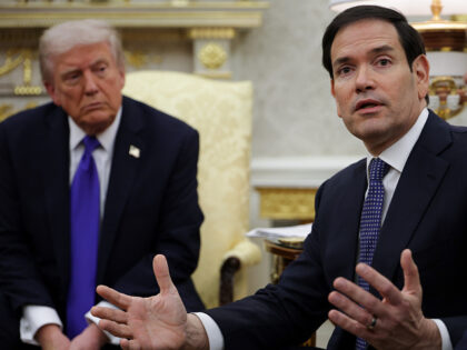 WASHINGTON, DC - OCTOBER 22: U.S. Secretary of State Marco Rubio (C) speaks to reporters d