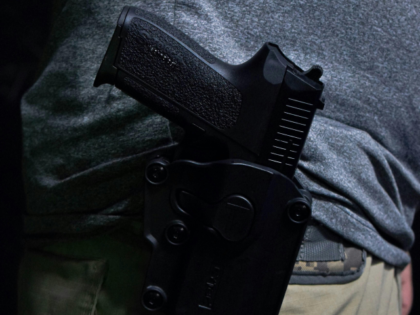 A Man with a Gun on His Waist