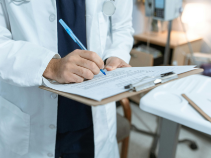 doctor holding chart