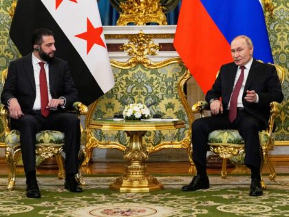 Russian President Vladimir Putin and Syrian interim president Ahmed al-Sharaa hold a meeti