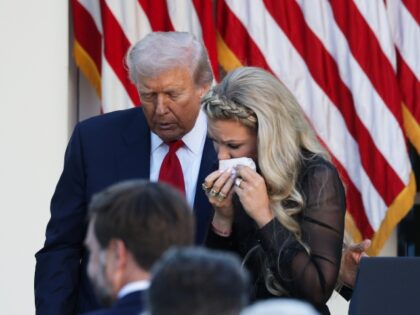 WASHINGTON, DC - OCTOBER 14: Erika Kirk (R), wife of late conservative activist Charlie Ki