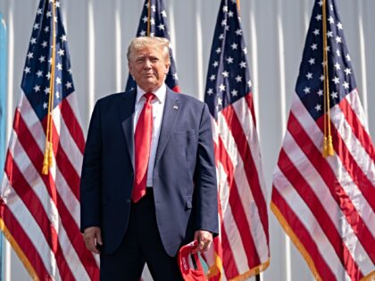 SUMMERVILLE, SOUTH CAROLINA - SEPTEMBER 25: Former President Donald Trump stands in front