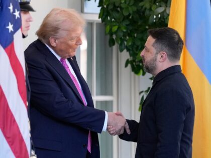 President Donald Trump, left, greets Ukraine's President Volodymyr Zelenskyy at the W