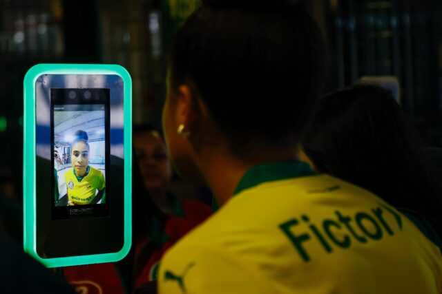 Fans entering a Sao Paulo stadium are scanned by facial recognition technology