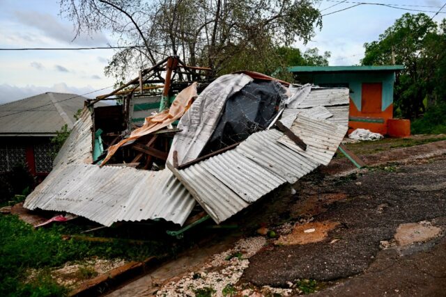 A store stands destroyed following the passage of Hurricane Melissa in Manchester, Jamaica