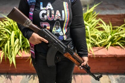 Thousands of Venezuelans have joined a civilian militia in response to President Nicolas M