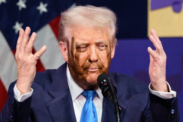 US President Donald Trump gestures as he speaks during the Asia-Pacific Economic Cooperati