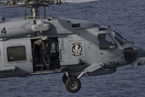 U.S. Navy helicopter, fighter jet crash into South China Sea