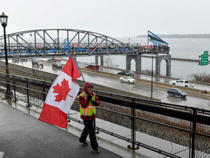 Title: Trump Tariffs Image ID: 25092792575359 Article: Elbows Up for Canada protesters gat