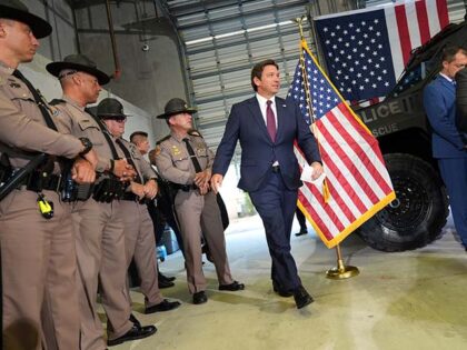 Title: Immigration Florida Image ID: 25121573731402 Article: Officers of the Florida Highw