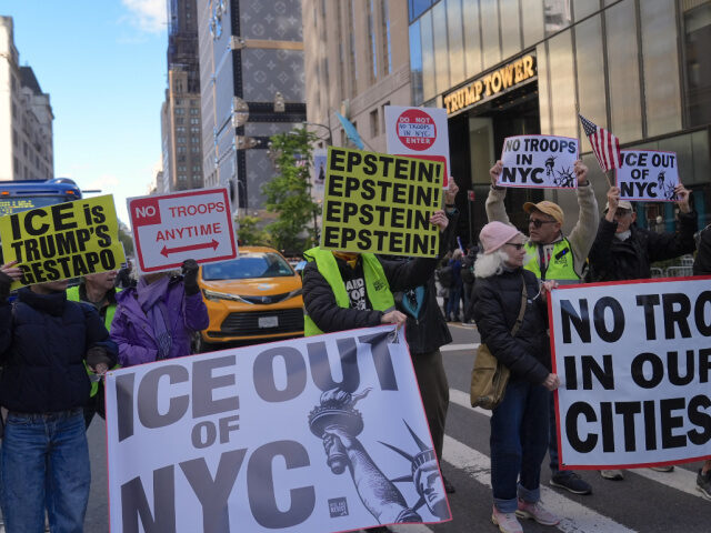 ro-immigrant and anti-ICE demonstrators rally outside of Trump Tower on Fifth Avenue for a