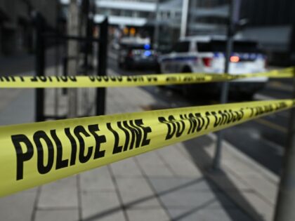 OTTAWA, CANADA – APRIL 29: Yellow police tape seals off a stretch of Rideau Street follo