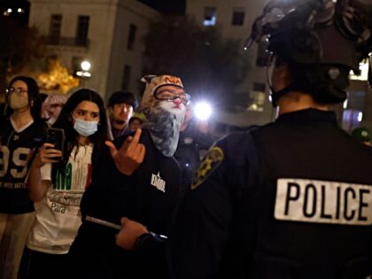 BERKELEY, CALIFORNIA - NOVEMBER 10: Protesters confront University of California police ou
