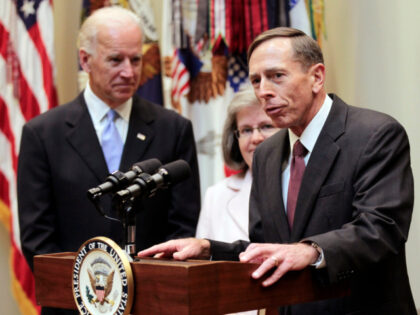 n this Sept. 6, 2011, file photo, new CIA director David Petraeus, right, speaks following