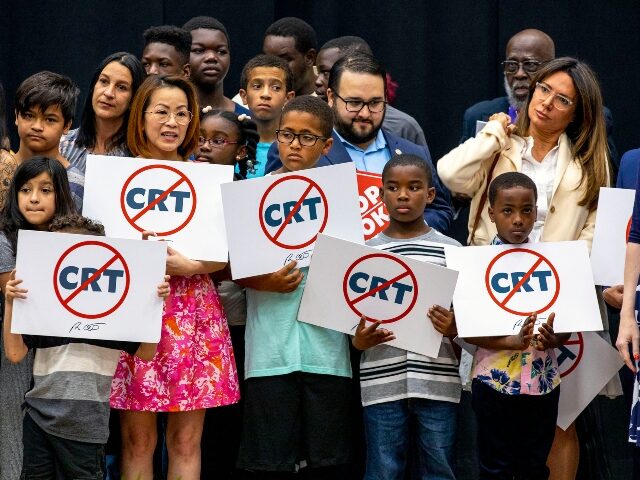 Children protest against CRT indoctrination