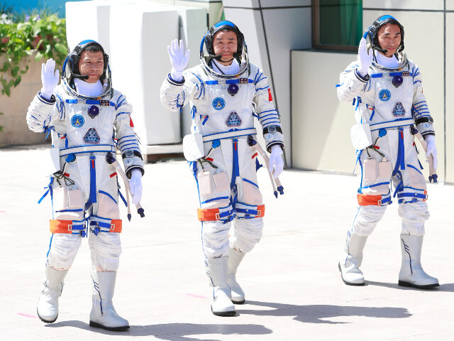 JIUQUAN, CHINA - APRIL 24: Chinese astronauts Chen Dong (C), Chen Zhongrui (R) and Wang Ji