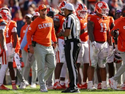 CLEMSON, SOUTH CAROLINA - NOVEMBER 1: Dabo Swinney of the Clemson Tigers talks to the offi