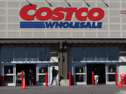 BAYONNE, NJ - MARCH 26: People enter and exit a Costco Wholesale store on March 26, 2023,