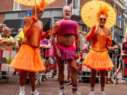 Drag queens are seen cheering the participants because of Pink Wednesday to show their sup
