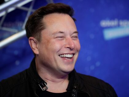 Elon Musk with a big smile