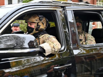 United States Immigration and Customs Enforcement (ICE) agents conduct operations in the L