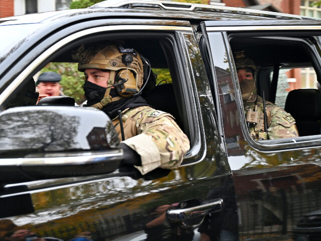 United States Immigration and Customs Enforcement (ICE) agents conduct operations in the L