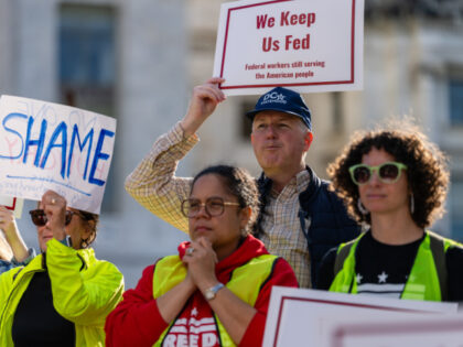 Demonstrators during a rally at a People's Pantry food drive for furloughed federal w