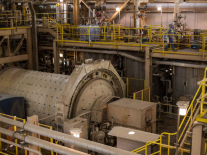 An employee walks through the processing facility at the Mountain Pass mine, operated by M