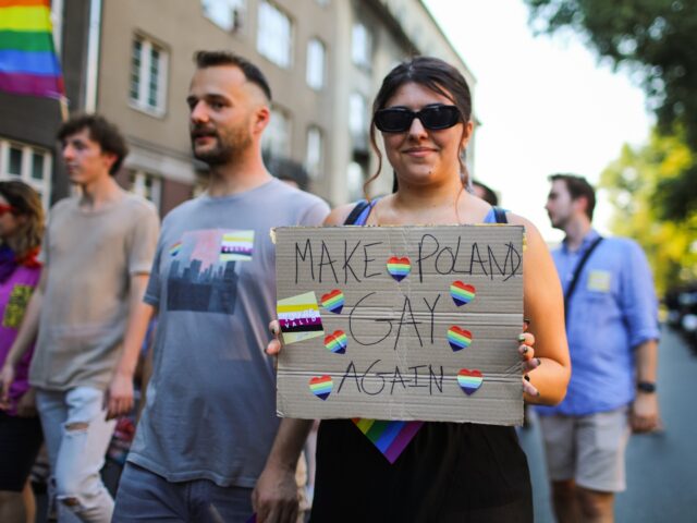 CRACOW, POLAND - 2021/08/14: A participant seen holding a placard saying "Make Poland Gay