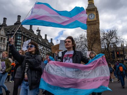 LONDON, ENGLAND - APRIL 20: Trans rights activists take part in a protest against the ban